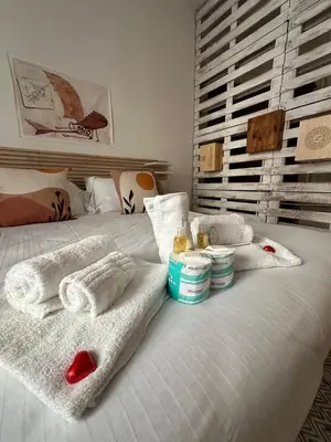 Letto o letti in una camera di Intero Appartamento - Casa Babette