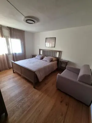 Letto o letti in una camera di La casina sul fiume