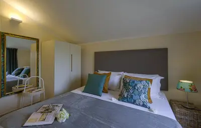 Letto o letti in una camera di Il Magnifico - Flo Apartments