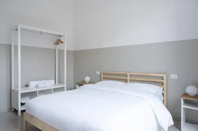Letto o letti in una camera di Duomo Apartment