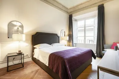 Letto o letti in una camera di Albizi Penthouse Luxury Apartment In Florence By Palazzo Pazzi Vitali