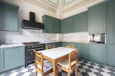 Cucina o angolo cottura di Albizi Penthouse Luxury Apartment In Florence By Palazzo Pazzi Vitali