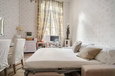 Letto o letti in una camera di Appartamenti a 200m Uffizi - 90m Ponte Vecchio