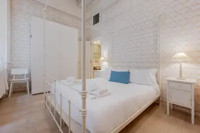 Letto o letti in una camera di Appartamenti a 200m Uffizi - 90m Ponte Vecchio