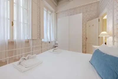 Letto o letti in una camera di Appartamenti a 200m Uffizi - 90m Ponte Vecchio