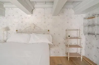Letto o letti in una camera di Appartamenti a 200m Uffizi - 90m Ponte Vecchio