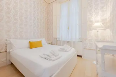 Letto o letti in una camera di Appartamenti a 200m Uffizi - 90m Ponte Vecchio