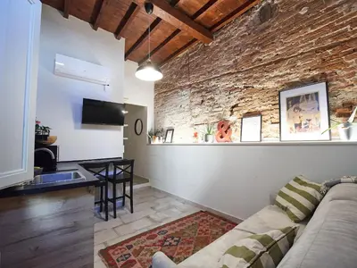 TV o dispositivi per l'intrattenimento presso Dante, apartment in the historic center
