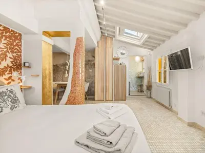 Letto o letti in una camera di Nido Loft
