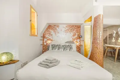 Letto o letti in una camera di Nido Loft