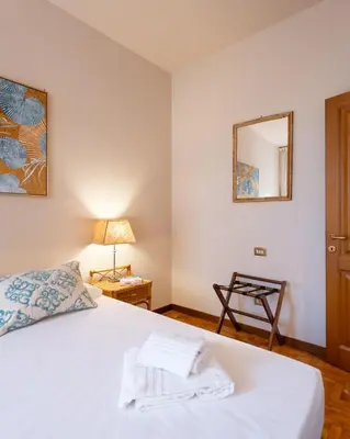 Letto o letti in una camera di Via Panzani 16, 4th Floor - Patrizia - Bright apartment 300m from Duomo and Train station