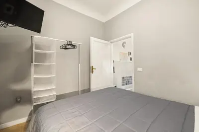Letto o letti in una camera di Passera history view residence C&G