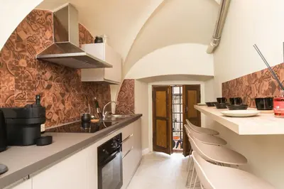 Cucina o angolo cottura di UNYCA - Florence Renaissance Apartment