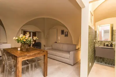 Area soggiorno di UNYCA - Florence Renaissance Apartment