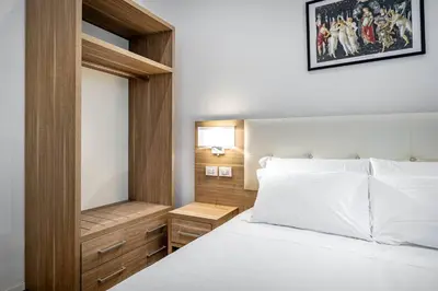 Letto o letti in una camera di YD elegant apt with garden