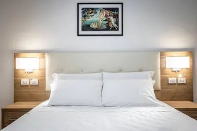Letto o letti in una camera di YD elegant apt with garden