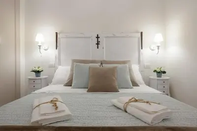 Letto o letti in una camera di Elegante Appartamento a 3 Minuti dal Duomo