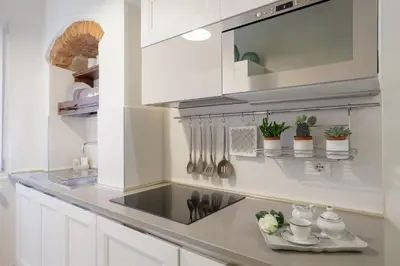 Cucina o angolo cottura di Elegante Appartamento a 3 Minuti dal Duomo