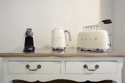 Set per la preparazione di tè e caffè presso Elegante Appartamento a 3 Minuti dal Duomo