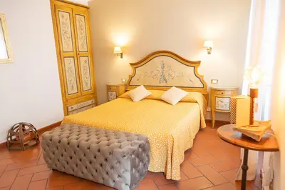 Letto o letti in una camera di Locanda dei Poeti Rooms & Apartments