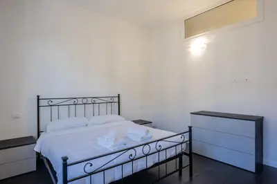 Letto o letti in una camera di Lungarno Apartment