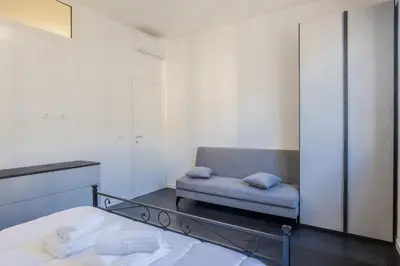 Letto o letti in una camera di Lungarno Apartment