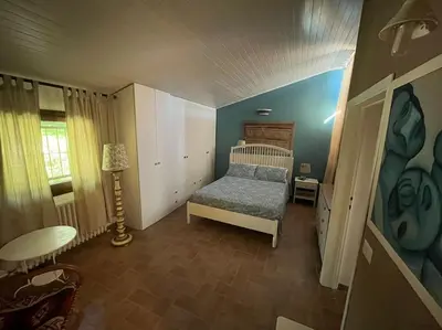 Letto o letti in una camera di Serenità a 2 passi da Firenze