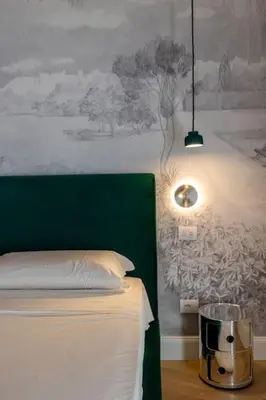 Letto o letti in una camera di Casa Bacco