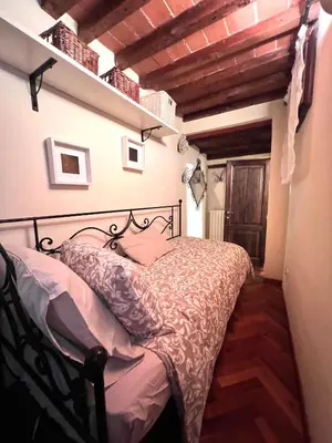Letto o letti in una camera di Pitti Sweet House