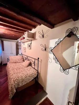 Letto o letti in una camera di Pitti Sweet House