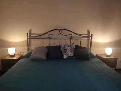 Letto o letti in una camera di Lo studio nel borgo