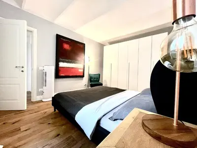 Letto o letti in una camera di Chic riverside 3-room apartment next to San Niccolò