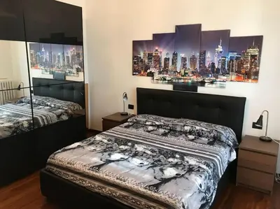 Letto o letti in una camera di Masaccio Guest House