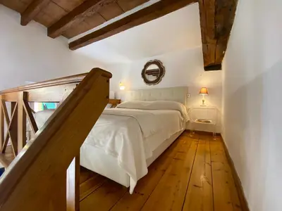 Letto o letti in una camera di Acacia Firenze - Abaco