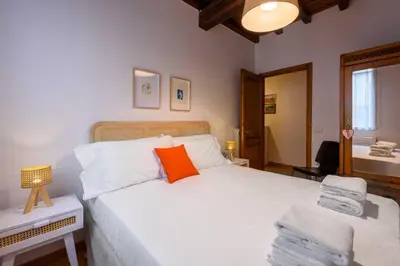 Letto o letti in una camera di Santa Maria Novella Palace by MMega