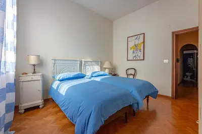 Letto o letti in una camera di Casa Angelina