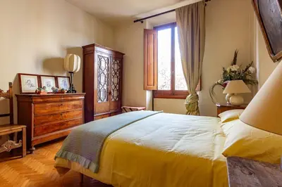 Letto o letti in una camera di Casa Angelina