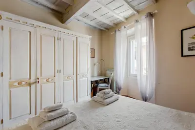 Letto o letti in una camera di GuestHost - The Sun of Florence Home