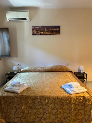 Letto o letti in una camera di Bocca's Apartment 8