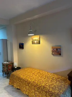 Letto o letti in una camera di Bocca's Apartment 8