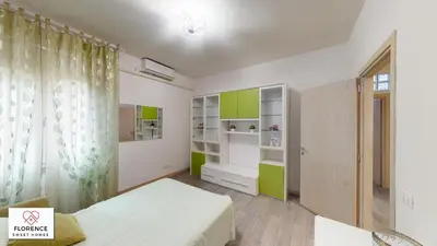 Letto o letti in una camera di Deledda Apartment by Florence Sweet Homes