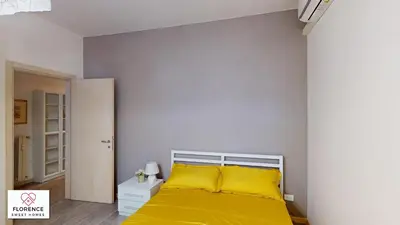 Letto o letti in una camera di Deledda Apartment by Florence Sweet Homes