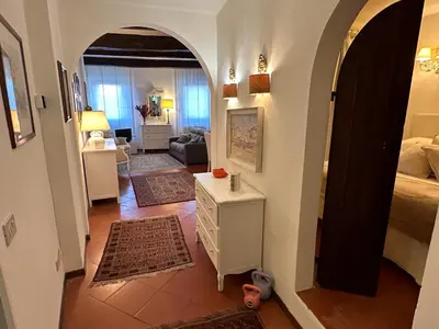 Letto o letti in una camera di Acacia Firenze - Flora