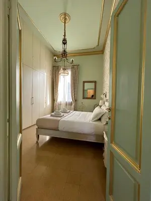 Letto o letti in una camera di Florentine Penthouse by FlorenceHospitality com