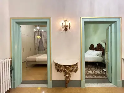 Letto o letti in una camera di Florentine Penthouse by FlorenceHospitality com