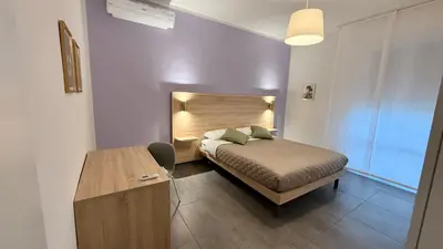 Letto o letti in una camera di Appartamento Lorenzo