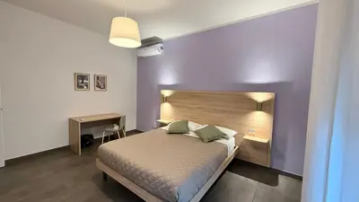 Letto o letti in una camera di Appartamento Lorenzo