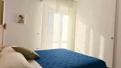 Letto o letti in una camera di Appartamento Lorenzo
