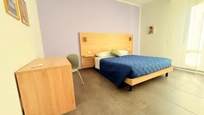 Letto o letti in una camera di Appartamento Lorenzo