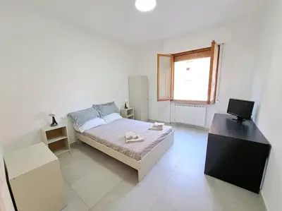 Letto o letti in una camera di Appartamento Puccini - Zona Firenze